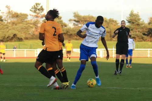 Enfields Muhammadu Faal (R) and Cheshunts Emmanuel Udoji (2) and Ethan Nelson-Roberts