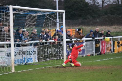 Cray keeper Lewis Carey guesses correctly but is beaten by Billy Bricknells penalty