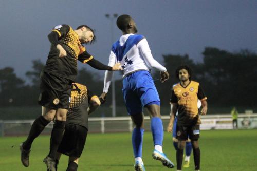 Crays Charlie Allen (L) heads clear from Junior Mubiayi