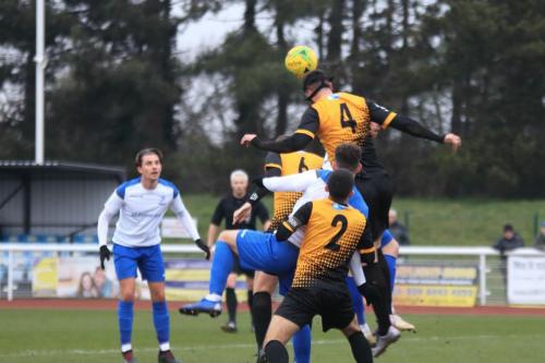 Crays Jay Leader (4) heads clear