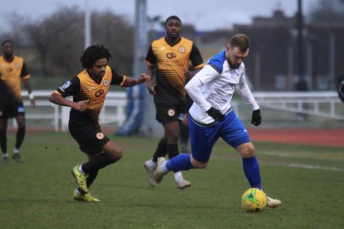 Enfields Billy Bricknell and Crays Bradley Pritchard (L) and Ben Mundele