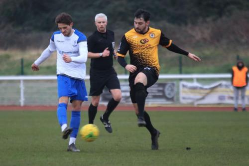 Enfields Josh Urquhart (L) and Crays Charlie Allen