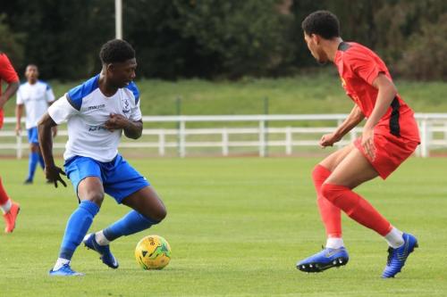 Enfields Charles Brown (L) and Mersthams Edwin Mensah