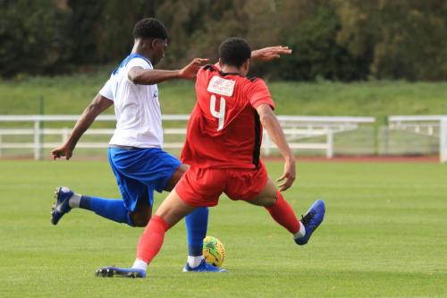 Enfields Charles Brown (L) and Mersthams Edwin Mensahx