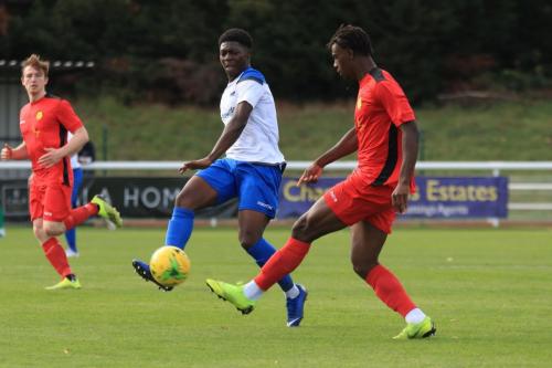 Enfields Charles Brown and Mersthams Sinnkaye Christie (R) and Eddie Dines