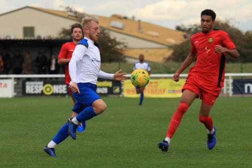Enfields Ryan Blackman (L) and Mersthams Edwin Mensah