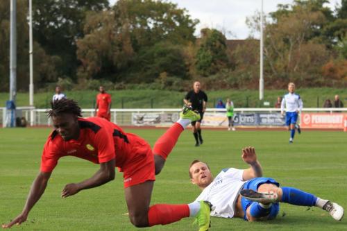 Enfields Sam Hatton (R) and Mersthams Sinnkaye Christie