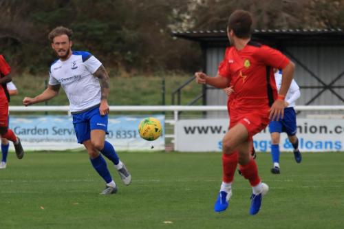 Enfields Scott Thomas (L) and Mersthams Bradley Wilson