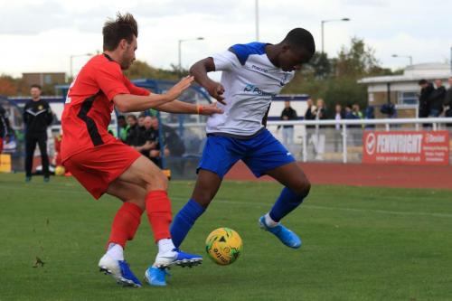 Mersthams Bradley Wilson (L) and Enfields Ken Charles