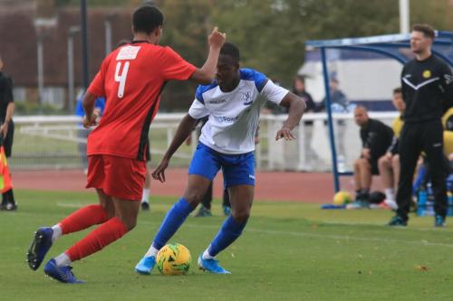 Mersthams Edwin Mensah (L) and Enfields Ken Charlesx