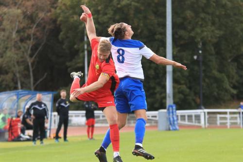 Mersthams Peter Wedgeworth (L) and Enfields Sam Youngs