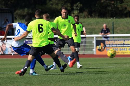 Enfields Ken Charles (L) shoots