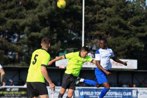 Enfields Ken Charles (R) heads just over the bar