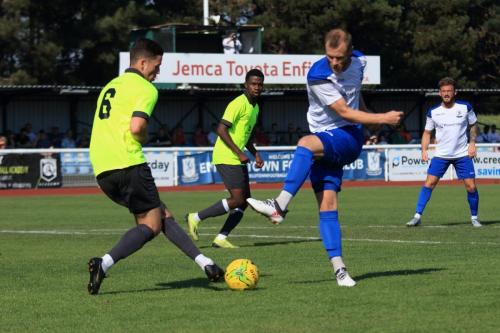 Enfields Sam Hatton shoots against Wiliam Wambeek (L)