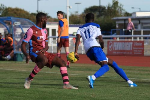 Casuals Juevan Spencer (L) and Enfields Muhammadu Faal