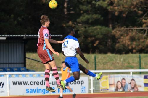 Casuals Robert Jamison (L) and Enfields Junior Mubiayi