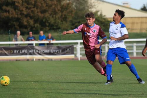 Casuals Robert Jamison (L) and Enfields Nathan Livings