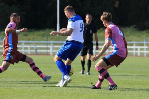 Enfields Billy Bricknell and Casuals Mu Maan (L) and Robert Jamison