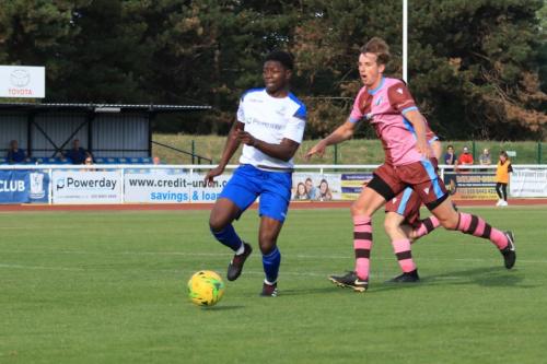 Enfields Charles Brown (L) breaks clear of Robert Jamison