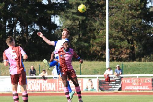 Enfields Marc Weatherstone and Casuals Jack Strange (L) and Juevan Spencer