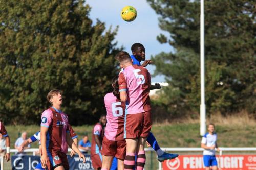 Enfields Muhammadu Faal challenges Jack Strange (5) and Coskun Ekim (6)