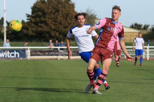 Enfields Sam Youngs (L) pressures Jack Strange into conceding a corner