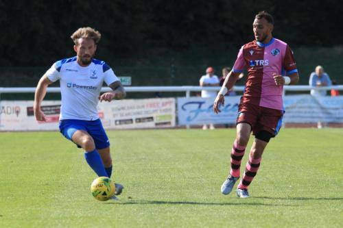 Enfields Scott Thomas (L) and Casuals Mu Maan