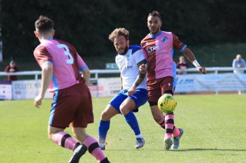 Enfields Scott Thomas and Casuals Mu Maan (R) and Jack Tucker