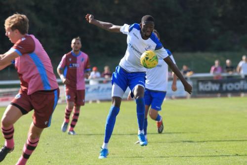 Muhammadu Faal chests the ball down