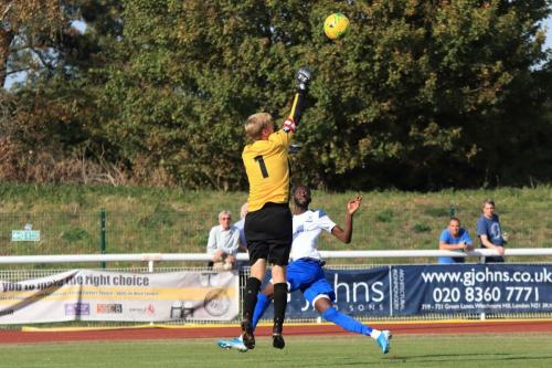 Muhammadu Faal lobs Danny Bracken for his second goal and Enfields third