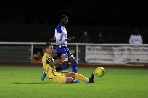 Enfields Muhammadu Faal shoots past Ryan Henshaws block but just wide of the post