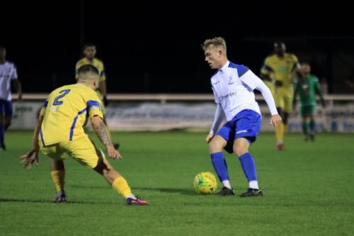 Enfields Ryan Blackman (R) and Stortfords Ben Sampayo