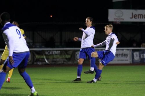 Enfields Ryan Blackman (R) shoots