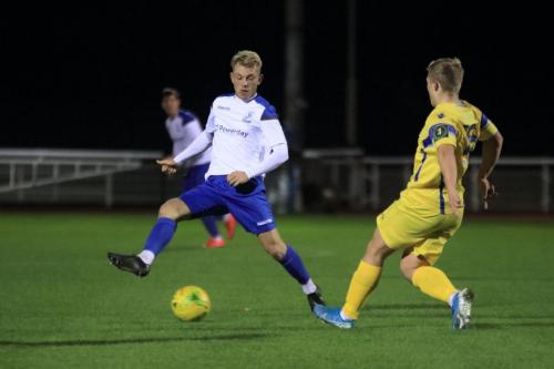 Enfields Ryan Blackman and Stortfords Alfie Mason (R)