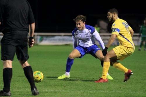 Enfields Scott Thomas (L) and Stortfords Jordan Chiedozie