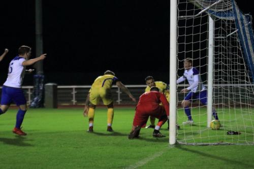 Ken Charles (out of shot)  puts Enfield 3-2 up