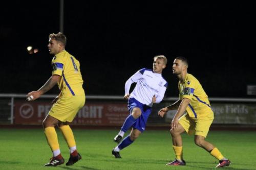 Ryan Blackman (centre) scores for Enfield to make it 1-1