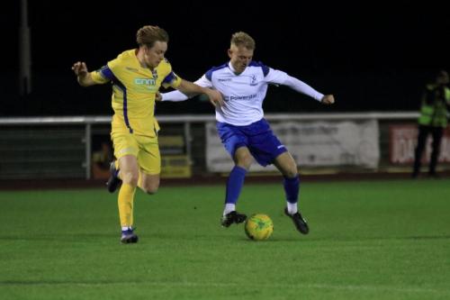 Stortfords Alex Warman (L) and Enfields Ryan Blackman