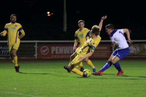 Stortfords Alex Warman blocks Alex Reads shot