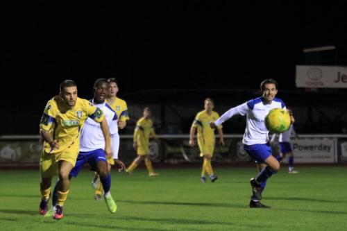 Stortfords Ben Sampayo (L) and Enfields Ken Charles and Sam Youngs (R)