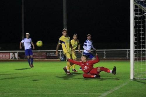 Stortfords Fed Burbidge palms the ball away but straight to Ken Charles who scores to make it 3-2