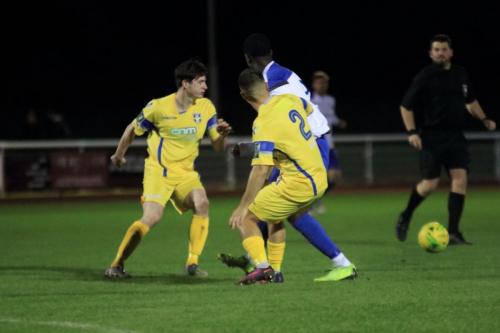 Stortfords Jack Thomas and Ben Sampayo (2) and Enfields Ken Charles