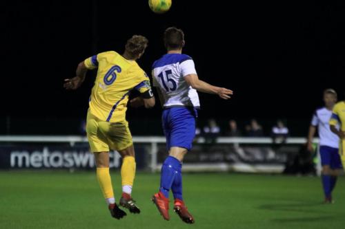 Stortfords Ryan Henshaw (L) and Enfields Alex Read