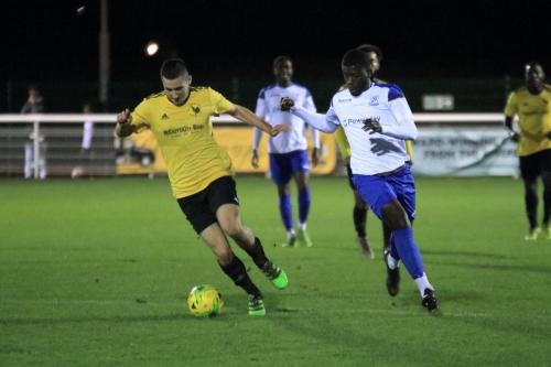 Broadfields Radu Stefanoaica (L) and Enfields Junior Mubiayi