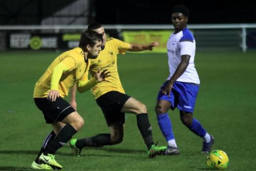 Broadfields Sam Horan (L) and Radu Stefanoaica and Enfields Charles Brown