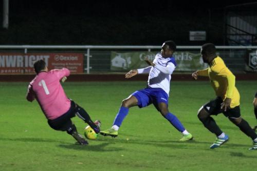 Broadfields keeper Kieran Jimmy brings down Ken Charles to concede a penalty