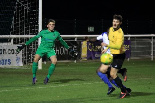 Enfield keeper Teddy Reynolds (L)