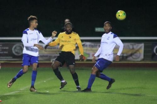 Enfields Dante McIntosh (L) and James Mulley and Broadfields Jamel Matten