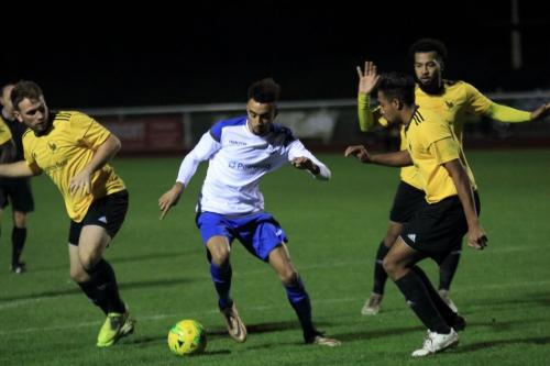 Enfields Dante McIntosh and Broadfields Ryan Phillips (L), Jordan Goode-Keeley and Marley Anderson-Richards (R, rear)