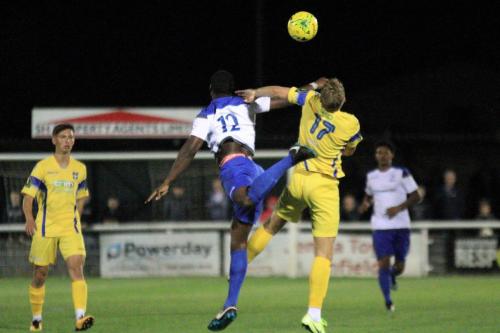 Enfields Alex Cathline (12) challenges Mark Haines